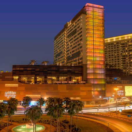 Swissôtel Al Ghurair Dubai Bagian luar foto The Fairmont Hotel in the evening
