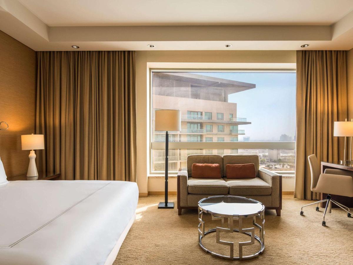 Swissôtel Al Ghurair Dubai Bagian luar foto Deluxe Room