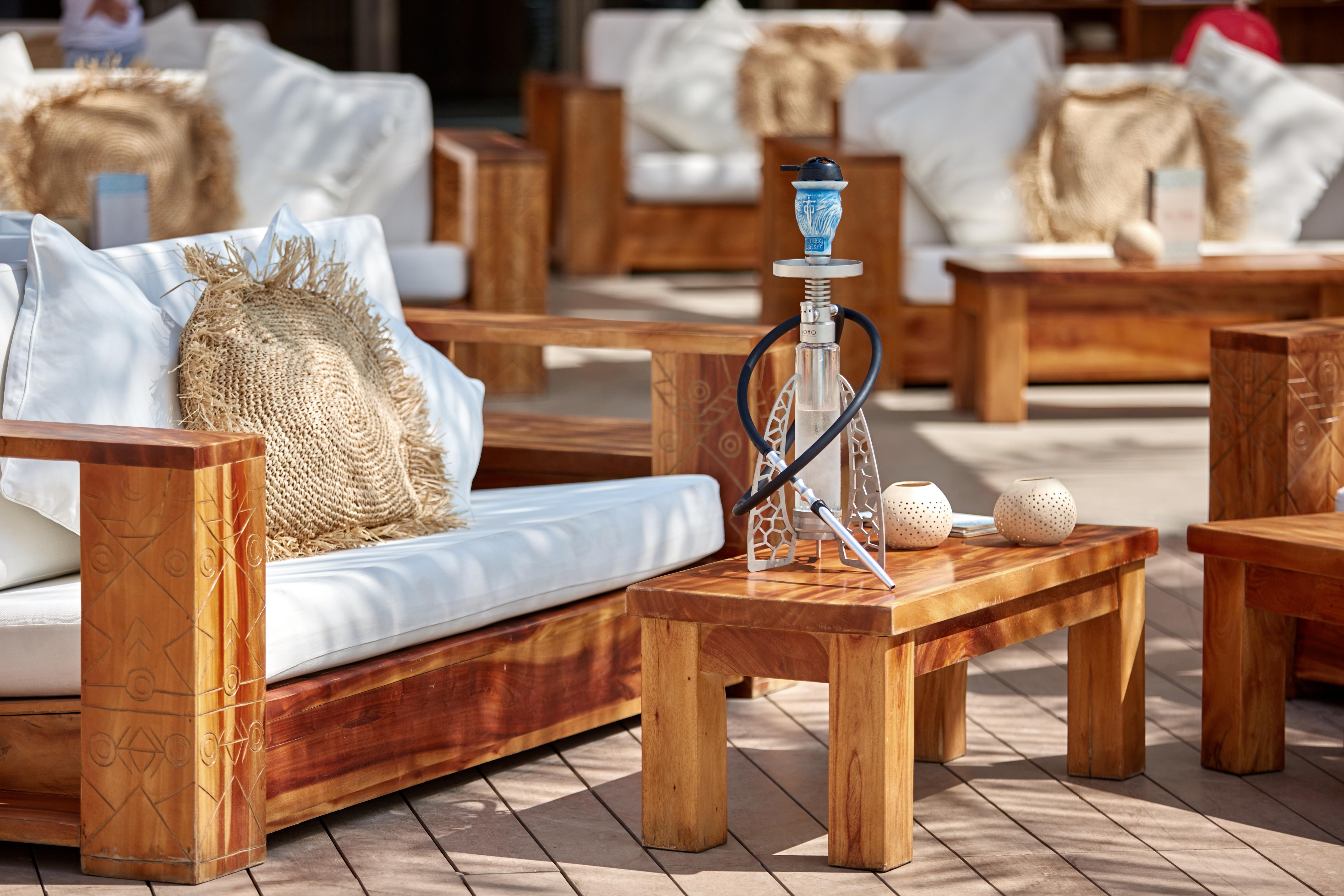 Swissôtel Al Ghurair Dubai Bagian luar foto A hookah on a table